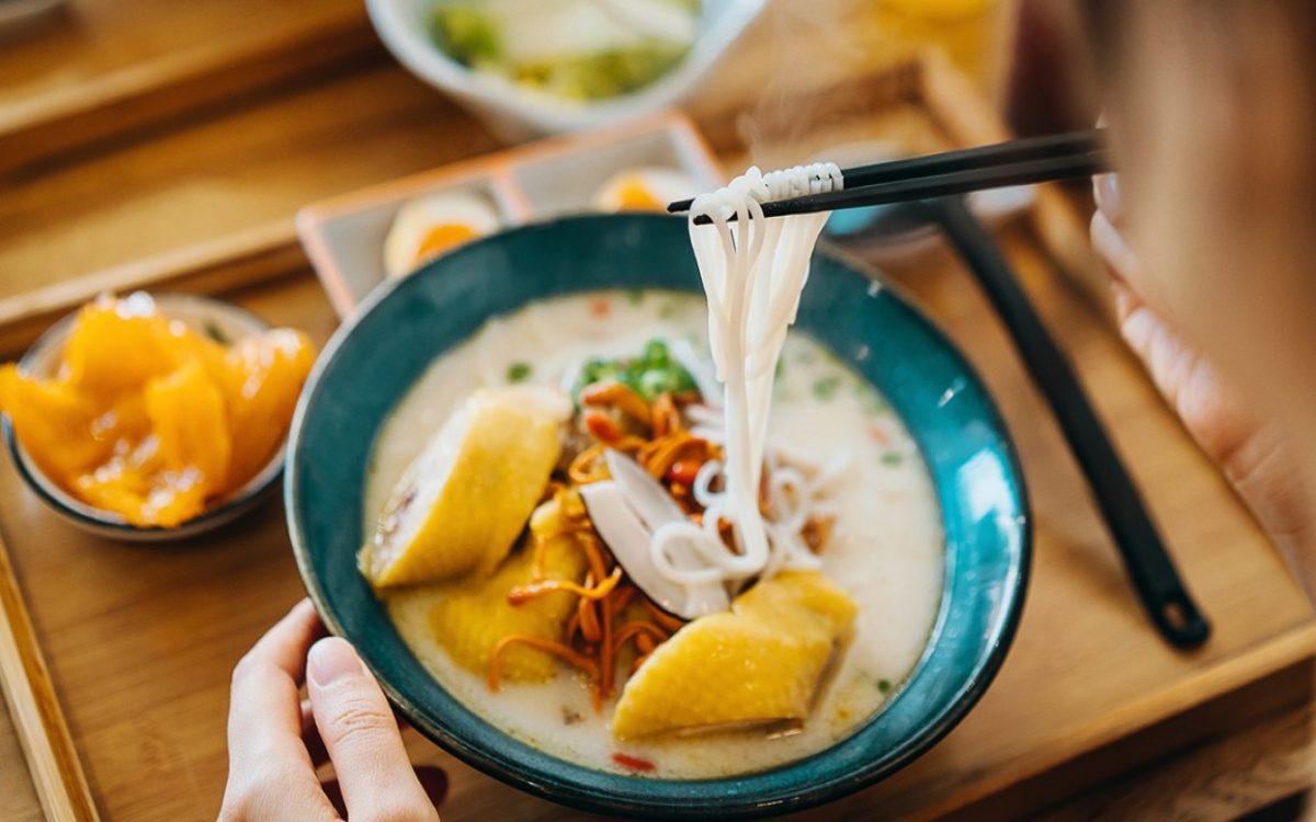 rice noodles in bowl of soup